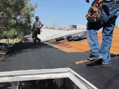 our Fair Oaks roofers are working on installing a new roof